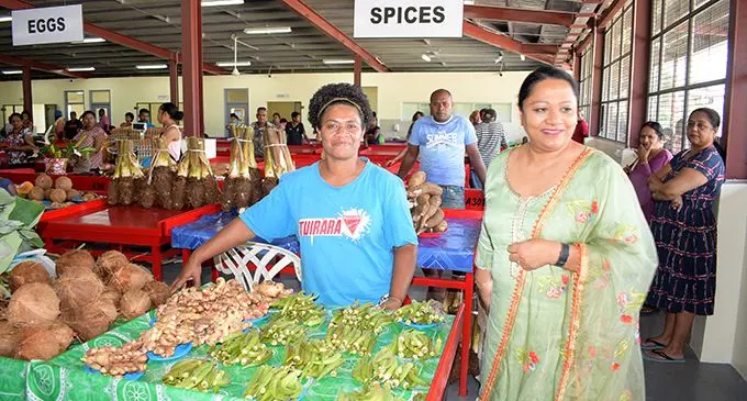 Laqere Market vendor, Sereana Tikimailepanoni (left) with Local Government Minister Premila Kumar after the market opening on May 13, 2020. Photo: Ronald Kumar.