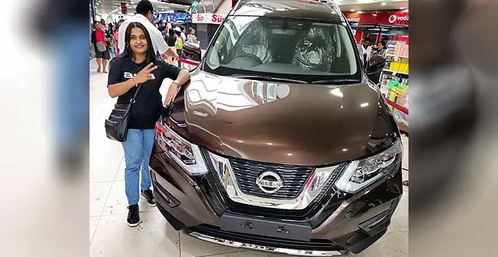 Pinu Devi with her brand new car.