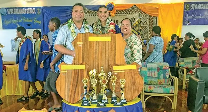 From left: Reverend Professor Upolu Va’ai (father), Suva Grammar School dux Luma Va’ai and mother Tuamasaga Va’ai after the Suva Grammar School prizegiving ceremony on December 4, 2020.  Photo: Kelera Sovasiga