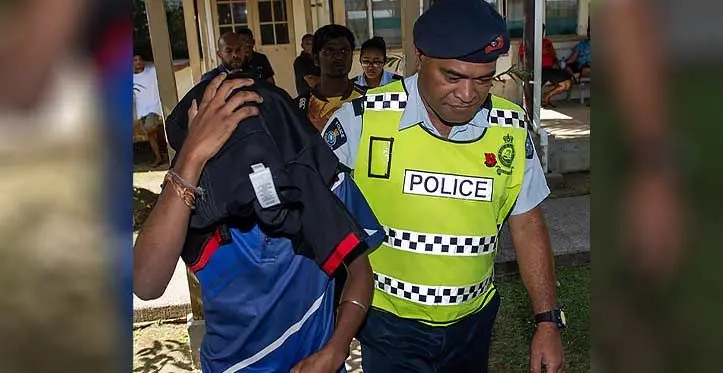 Police escort Nasese Bus driver Ronal Vikash Nair at the Suva Magistrates Court on October 30, 2023. Photo: Leon Lord