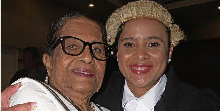 Gayle Manueli, 26, with grandmother, Cecilia Manueli (left), after being admitted to the bar on February 2, 2019. Photo: Ronald Kumar