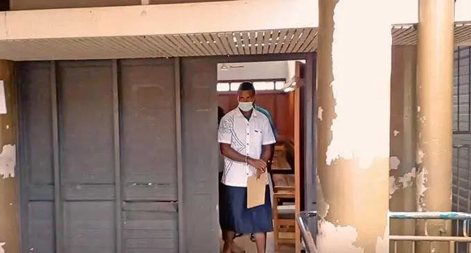 Alivereti Lesukiyasawa is escorted to the Lautoka Magistrates Court on February 22,2022.  Photo: Salote Qalubau