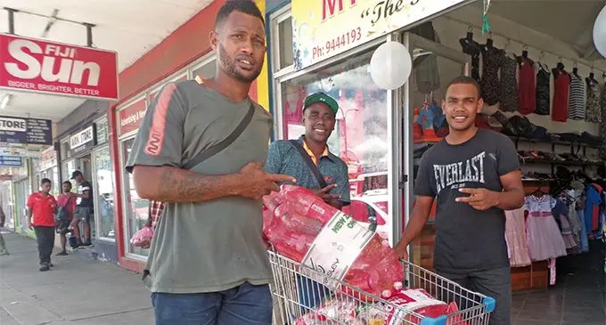 From left Inoke, Sowani Varea and KJ posing with the empty bottles in Lautoka on March 8, 2019. Photo: Rohit Kumar