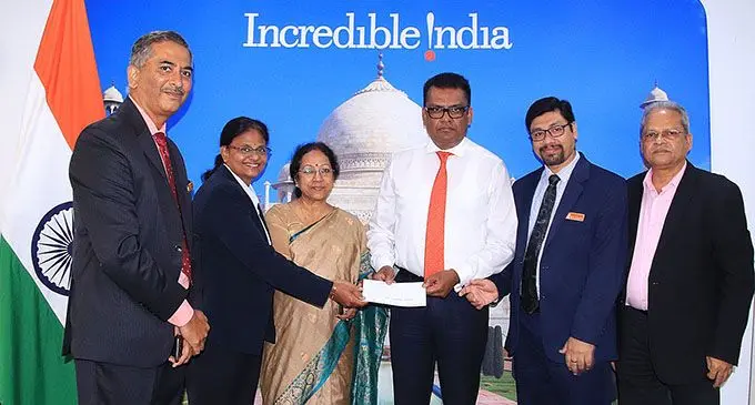(at the centre)  India’s High Commissioner to Fiji Her Excellency Padmaja while presenting the donation to the Permanent Secretary, Office of the Prime Minister, Immigration and Sugar Industry and Acting Permanent Secretary Foreign Affairs, Mr Yogesh Jitendra Karan.  