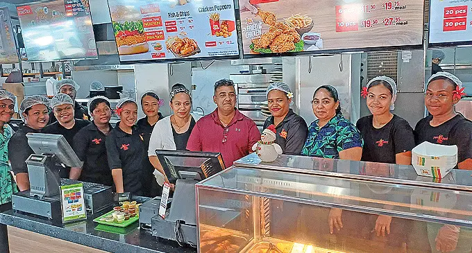 VCORP Pte Limited managing director Vinesh Dayal (fifth from right) with his wife Rachel Dayal and staff of LunchBox in Labasa on December 29, 2023. Photo: Shratika Naidu