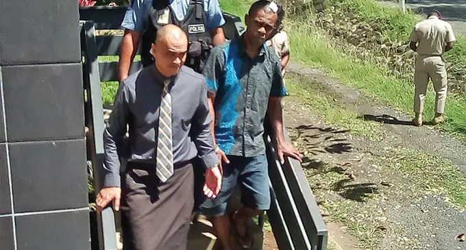 Frederick Epeli (in necktie) outside the Lautoka court house. Photo: Rohit Kumar