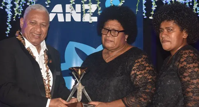 Prime Minister Voreqe Bainimarama hands over the Visionary award to Radini Tui Lawa Adi Merewai Vatunitu and Salanieta Lumuni at the 2017 ANZ Fiji Excellence in Tourism Awards at the Denarau Convention Centre. Photo: Waisea Nasokia.