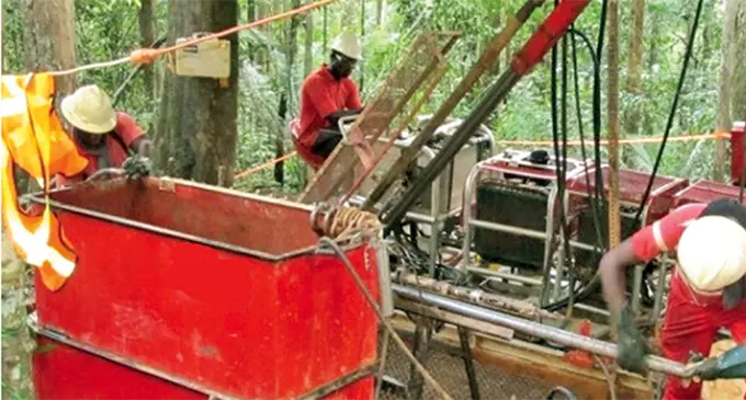 Men at work ...Bonga Xploration Drilling Ltd’s machines in use at a mineral exploration site in Fiji.