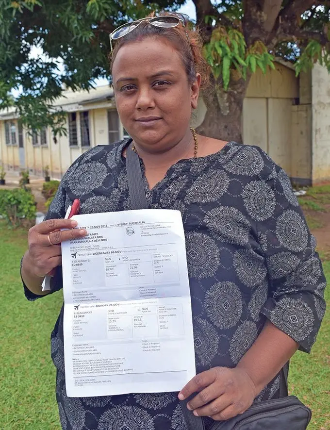 Shalini Deo showing her ticket which she had paid for at Go Local Holidays in Martintar, Nadi. Photo: Nicolette Chambers