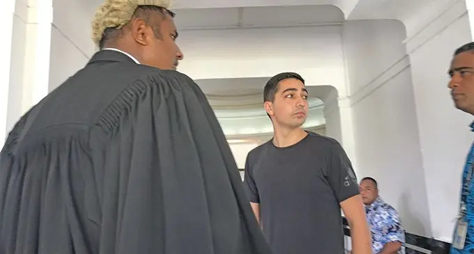 Joshua Aziz Rahman (centered)