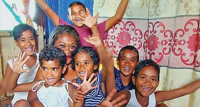 Makelesi Drau with her six children, (from left): Mereseini Marama, Temalesi Tavasere, Wanni Valentine, Kelera Verevou, Epeli Drau and Sereima Davetamatia inside their home at Vunato Settlement in Lautoka on September 2, 2022. Photo: Nicolette Chambers