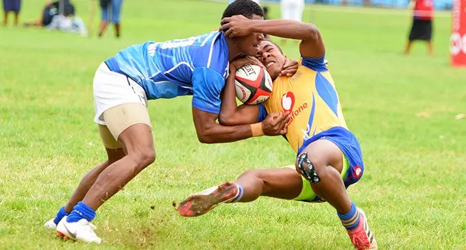 Asesela Tagicakibau of Suva Grammar School Under-16 side cops a tackle against Nasinu Secondary in the Vodafone Southern Zone playoffs at  Bidesi Park, Suva on July 13, 2019. Photo: Ronald Kumar  Photo: Laisa Lui 