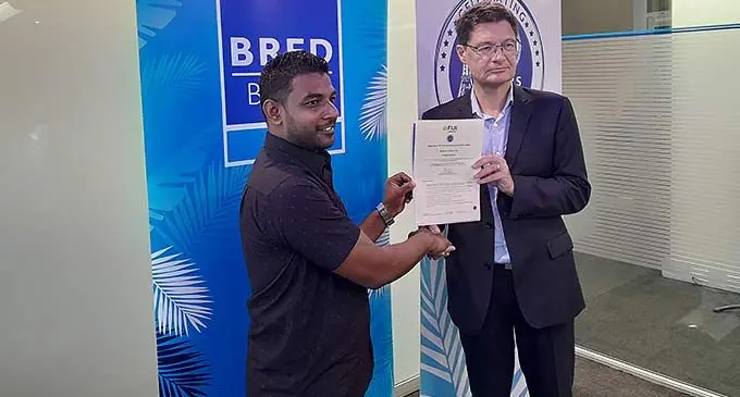 One of 10 winners of BRED Bank’s $2000 air travel winners, Sarnesh Deo met with the French bank’s chief executive officer Thierry Charras -Gillot in Suva on December 8, 2022. Photo: Photo: Sosiveta Korobiau