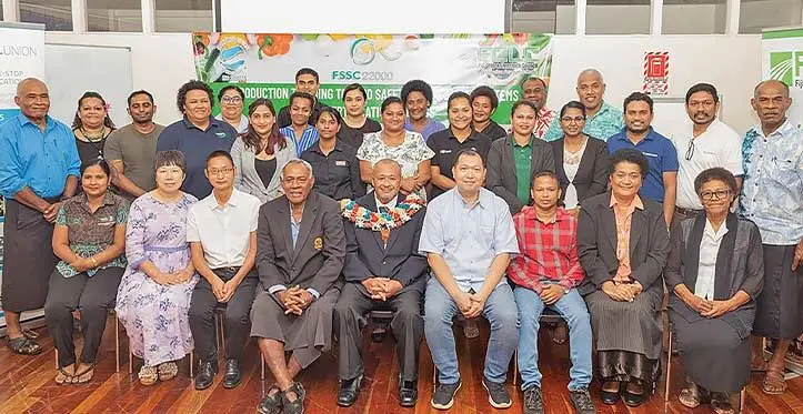 Participants of the Food Safety Workshop with Permanent Secretary for the Ministry of Agriculture and Waterways, Andrew Tukana (seated centre with garland), Fiji Crop and Livestock Council chairman Josua Nalewakalou (seated fourth from left) and Control Union general manager James Wang (seated fourth from right)