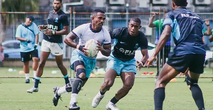 Police playmaker Terio Tamani (with ball) runs away from Rokoua Rasaku of the Fiji Airways national sevens team during their friendly encounter at Albert Park, Suva, on February 15, 2023. Photo: FRU Media