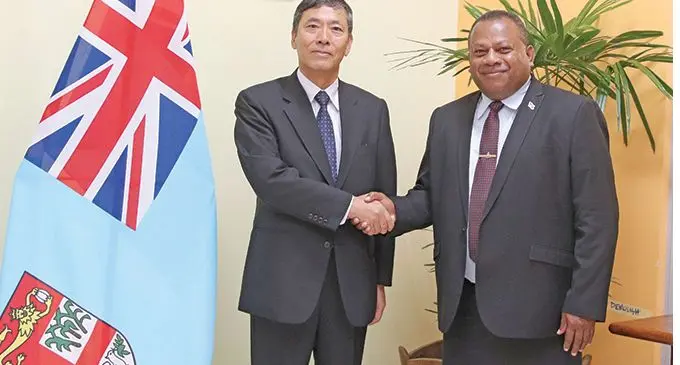 Japanese Ambassador for the Pacific Island Region Toshihisa Takata with Minister for Defence, National Security and Foreign Affairs Inia Seruiratu, at the Ministry of Foreign Affairs headquarters in Suva.