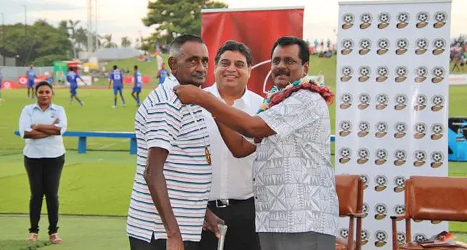 Minister for Youth and Sports Parveen Bala honours former Lautoka player Naga Sanjeeri at Churchill Park, Lautoka. Photo:  Ministry of Youth and Sports