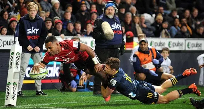 DUNEDIN, NEW ZEALAND - JULY 04: Sevu Reece of the Crusaders dives over to score a try during the round 4 Super Rugby Aotearoa match between the Highlanders and the Crusaders at Forsyth Barr Stadium on July 04, 2020 in Dunedin, New Zealand. (Photo by Joe Allison/Getty Images)