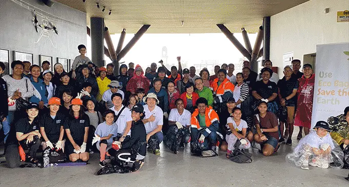 KOICA Alumni members after a cleanup at Nasese Coastline area .
