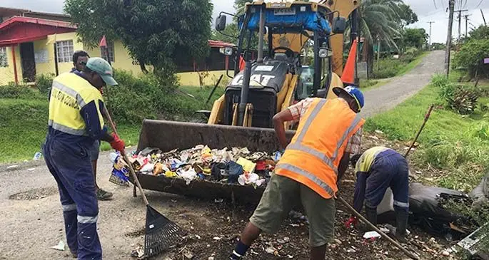 Nasinu Town Council workers clearing away rubbish that was piled along the roadside. Photo: Renu Radhika