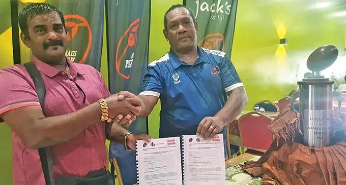 All in One Group of Companies director Sulendra Raju (left) seals the deal with Nadi Rugby Union president Mataiasi Nabou in Nadi on June 14, 2022. Photo: Waisea Nasokia