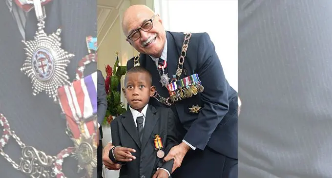 Bravery Medal recipient Aqoriniasi Dreu, 5, with President Major-General (Ret’d) Jioji Konrote at the State House in Suva on November 29, 2019.  Photo: Ronald Kumar