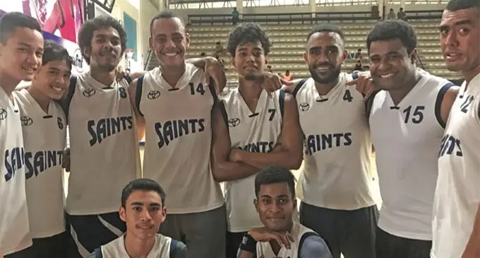 USP One basketball team (wearing the Saints jumper) in Suva on April 20, 2019.