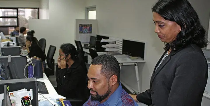 Newly appointed Consumer Council Chief Executive Officer Seema Shandil (right) with staff on January 31, 2019. Photo: Ronald Kumar
