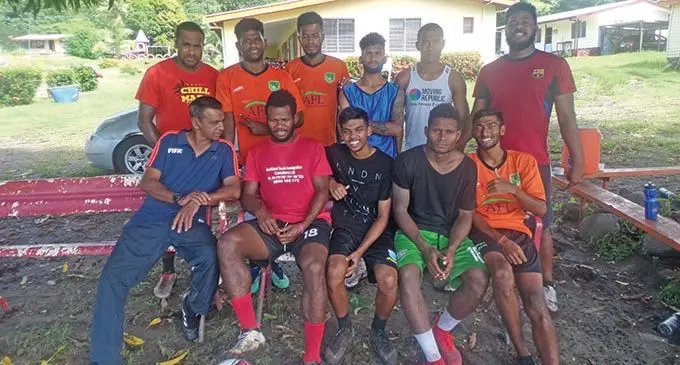 Suva football coach Saroj Kumar (sitting- left) with players at their camp in Tavua on April 30, 2019.  Photo: Rohit Kumar