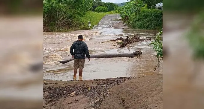 Several crossings and roads around the country were inaccessible as a result of floodwaters from heavy rain. PHOTO: LTA