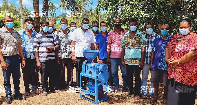 Minister for Agriculture, Environment and Waterways, Mahendra Reddy (in white shirt) with members from the Nubu Rice Farmers Cooperative in Lagalaga, Macuata on November 23, 2021. Photo: Sampras Anand