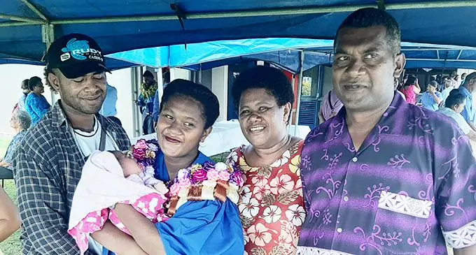 From left: Paula Baleveikau (husband), Lusia Tinai and her daughter Ilivema Rumasekea, Mere Baleinaikawalu (mother), and Iliakimi Namusukia (father), after the graduation ceremony on March 11, 2020.  Photo: Shreeya Verma
