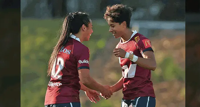 Former Fijian Track star Helena Young (right)