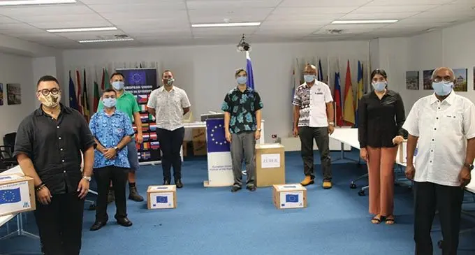 European Union Ambassador to Fiji and for the Pacific Sujiro Seam (fifth from left), with NGO representatives during the hand over.   Photo: Delegation of the European Union for the Pacific