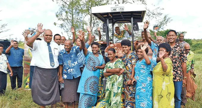 Deputy Prime Minister and Minister for Trade, Co-Operatives and Small and Medium Enterprises and Communications, Manoa Kamikamica with villagers during the handing over of a tractor to Nukusolevu Co-operative Limited in Nasarawaqa Village, Lekutu, Bua on May 1, 2023.