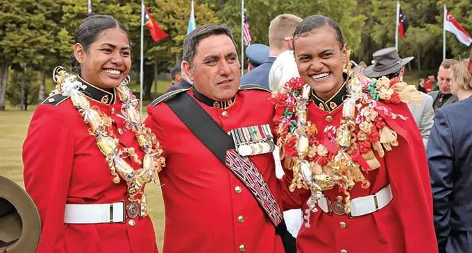 Second Lieutenant Merelesita Cakau (left), Waiouru Military Camp Warrant Officer Class Two Glen Savage and Second Lieutenant Grace Qasevakatini after graduating as commissioned officers at Waiouru Military Camp in New Zealand on December 4, 2020.