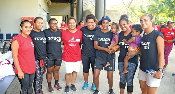 Minister for Women and Poverty Alleviation Mereseini Vuniwaqa (fourth from left) with members of the Touch Fiji women’s team and their children after the Vital Voices Global Mentoring walk on March 9,2019. Photo: Ministry of Women Children and Poverty Alleviation.