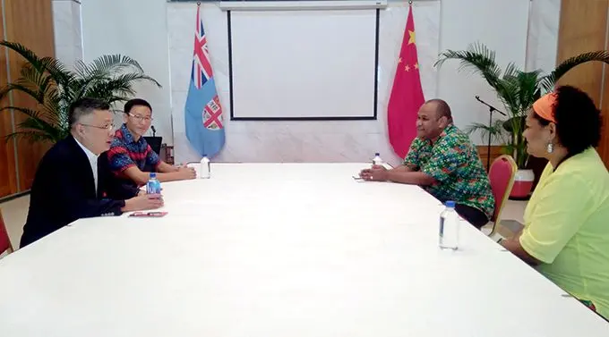 Chinese Ambassador Qian Bo (first from left), Political Division Director in Fiji, Li Jiabing with Eroni Duaibe and his wife Asilika Duaibe.  