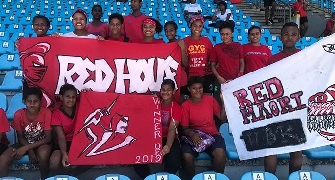 Red house members cheer on their athletes.