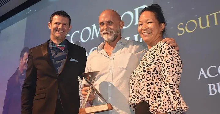South Sea Island general manager Craig Mercer (middle) receives the award.. Photo: Waisea Nasokia