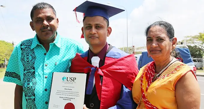A proud moment for parents Durga Prasad and Hem Wati as their son Shiu Kumar graduates with a Doctor of Philosophy in Engineering at the USP Graduation on September 19, 2019. Photo: Kelera Sovasiga