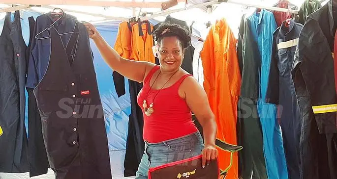 Francis Natadra with some of the overalls sold at her stall in the Navutu, Lautoka Flea Market. Photo: Salote Qalu