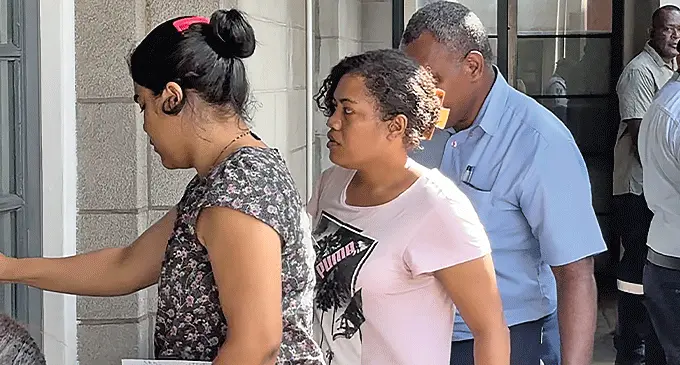 Talei Siteri Bola (middle) entering the Suva Magistrate’s Court yesterday. Photo: Beranadeta Nagatalevu