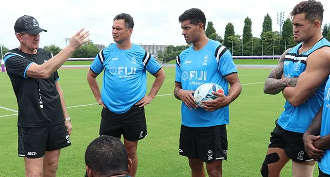 Fiji Airways Flying Fijians assistant coach Neil Barnes (left), with senior assistant coach Tabai Matson while Ben Volavola (with ball) and Jale Vatubua in Oita, Japan. Photo: FRU Media