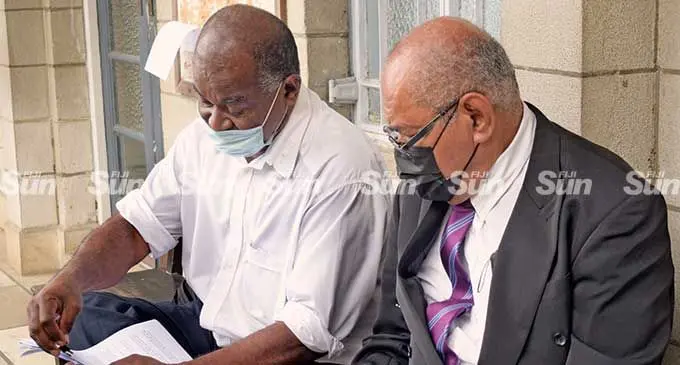 Niko Nawaikula (left) with lawyer Sevuloni Valenitabua outside High Court on March 2, 2022.  Photo: Ronald Kumar
