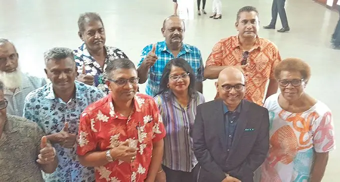 Accident Compensation Commission Fiji chief executive officer Parveez Akbar (front second from right), with Sugarcane Growers Council chief executive officer Vimal Dutt and farmers in Lautoka. Photo: Waisea Nasokia