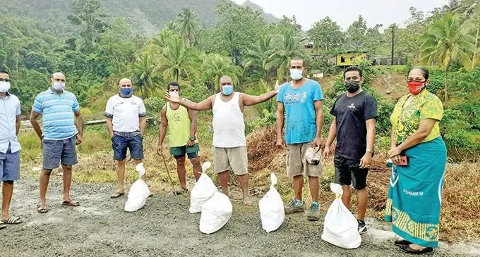 Residents of Waikasi Settlement in Wainadoi, Navua receiving food rations from Worthy Works Fiji on June 16, 2021. Photo: Ronald Kumar