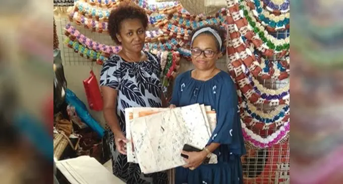 TEP recipient of $500, Merelesita Seniyasi (right), received her items from vendor, Tory’s Handicraft, Stall 60, South Mall City Flea Market, Suva.