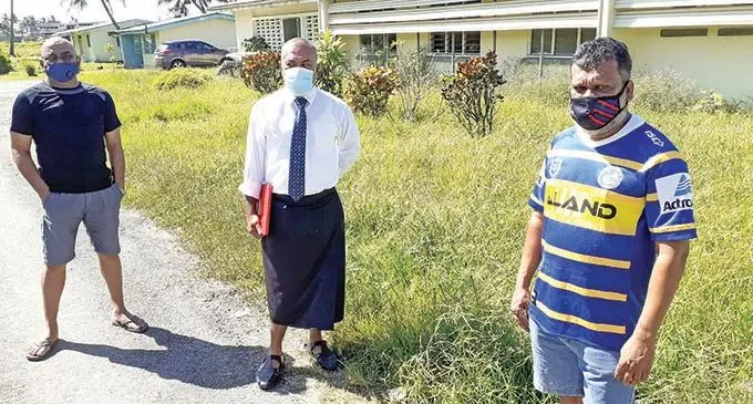 From left; Serua and Namosi advisory council chairman, Kamal Narayan, Iferemi Buaserau and area advisory councillor, Gopal Naidu at the old Navua Health Centre site. Photo: Ronald Kumar