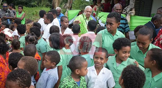 Prime MInisyter Voreqe Bainimarama with Ratu Veikusu Primary School student in Buretu Tailevu after opening the teachers quarters on October 22, 2019. Photo: Ronald Kumar.
